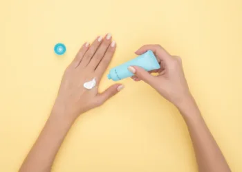 Korean sunscreen being tested by a girl on her hand