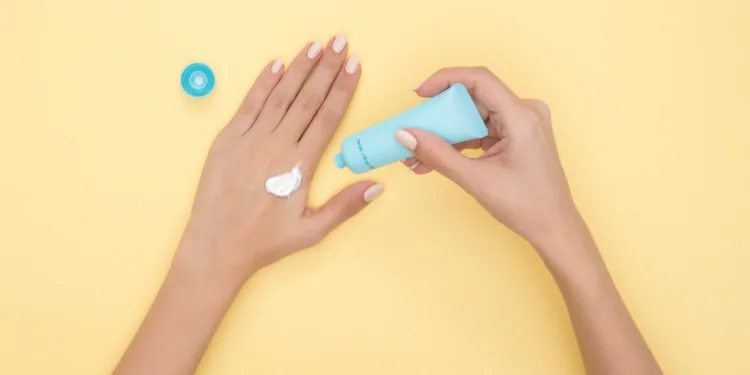 Korean sunscreen being tested by a girl on her hand