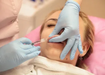 a girl getting Korean cherry lips treatment