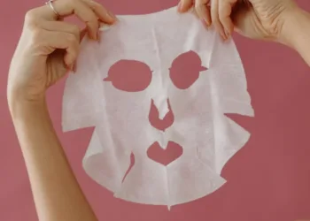 Korean sheet mask being held by a girl for photoshoot